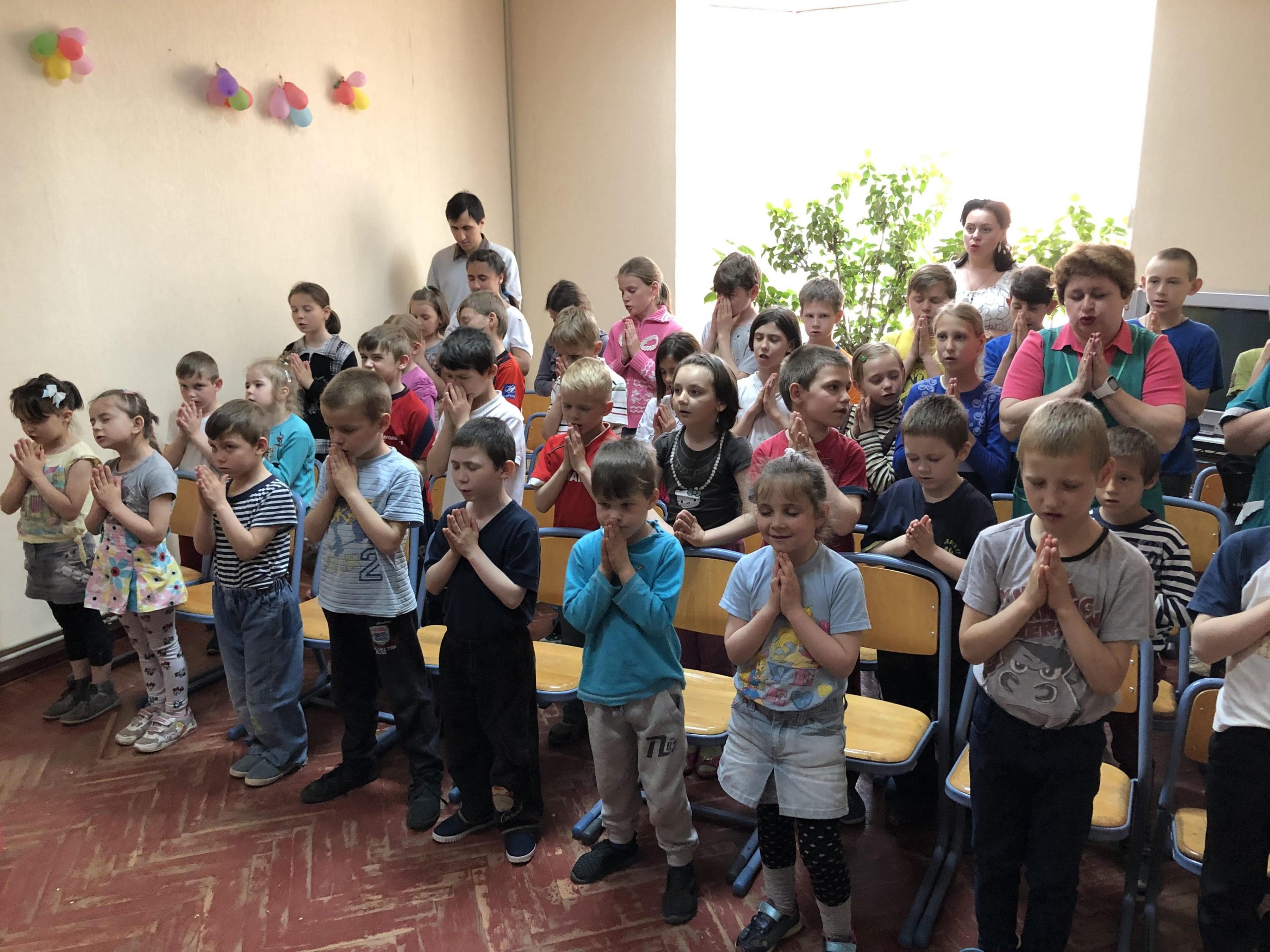 Children praying.