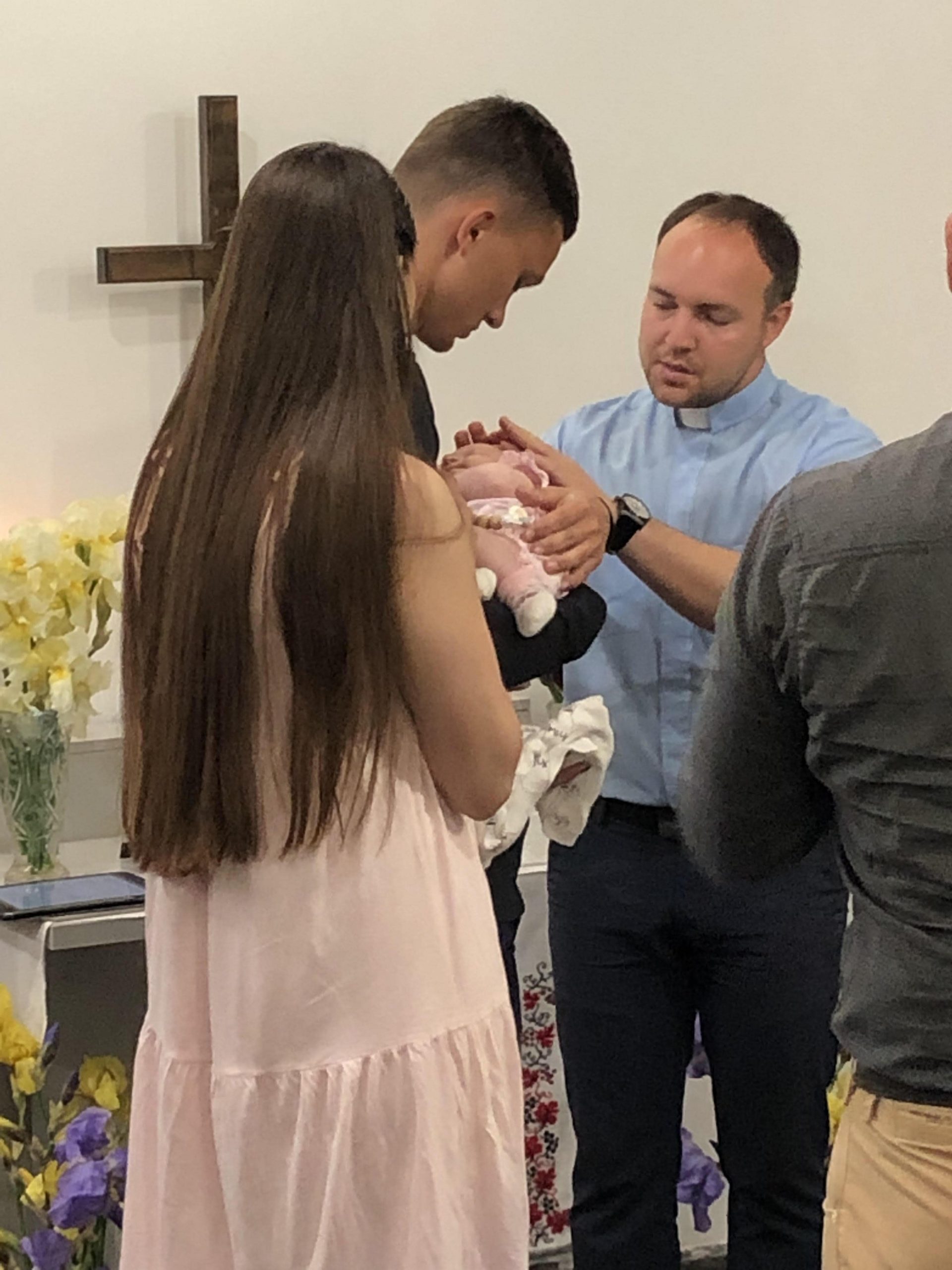 Infant being baptized.
