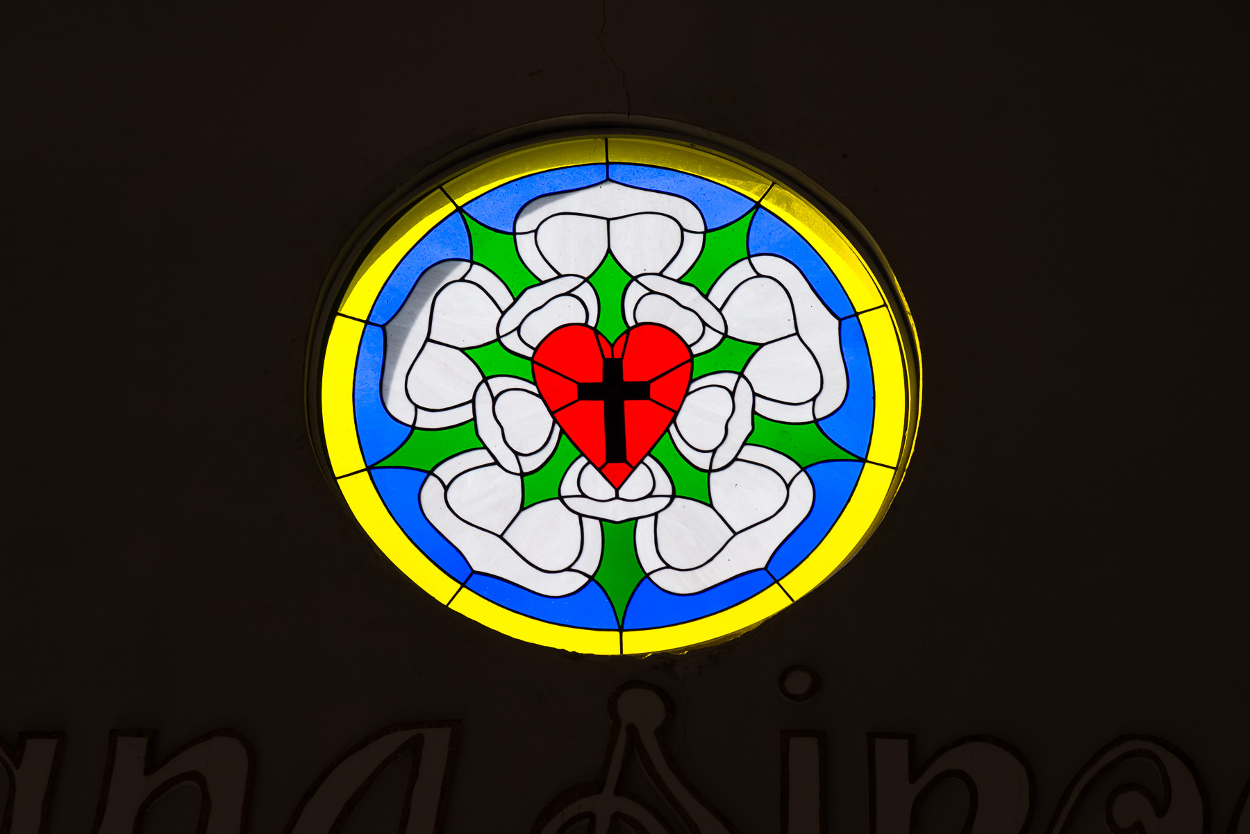 Stained glass of Luther Rose.