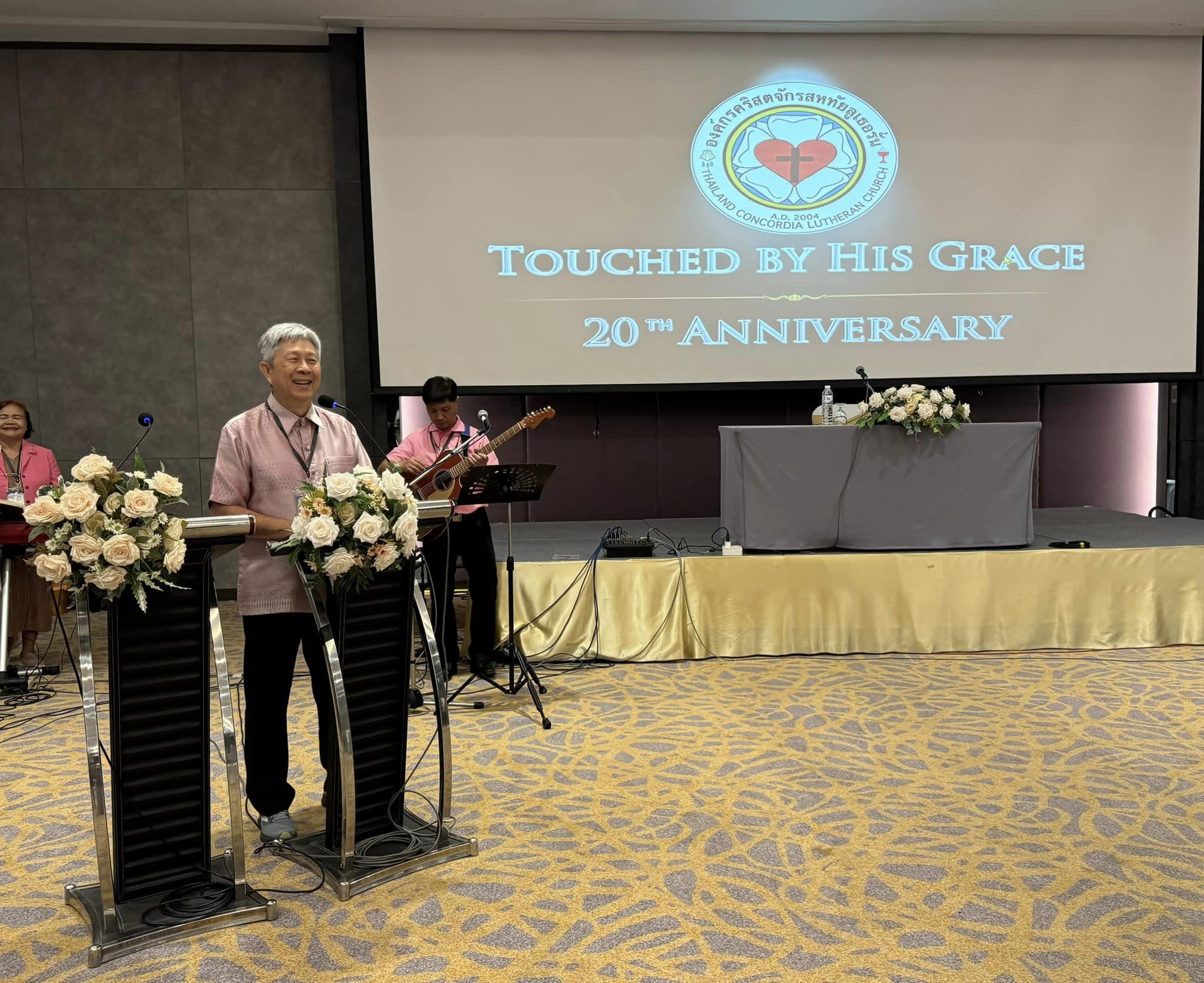 Bishop presenting at convention.